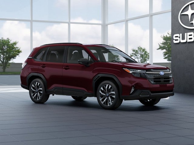 2026 Subaru FORESTER Touring in Dark Mahogany Pearl — front three-quarter view